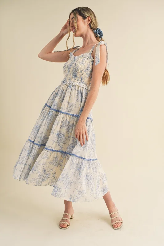 Refresh your wardrobe with trendy women’s apparel Light Blue Floral Sleeveless Ruffle Tiered Midi Dress Refresh your wardrobe with trendy women’s apparel Light Blue Floral Sleeveless Ruffle Tiered Midi Dress