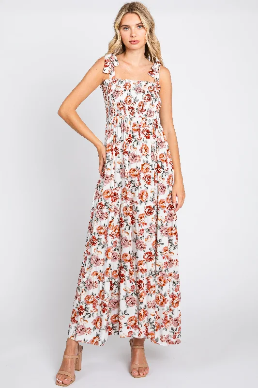 Dress to impress with elegant women’s wear Cream Floral Smocked Shoulder Tie Tiered Maxi Dress Dress to impress with elegant women’s wear Cream Floral Smocked Shoulder Tie Tiered Maxi Dress