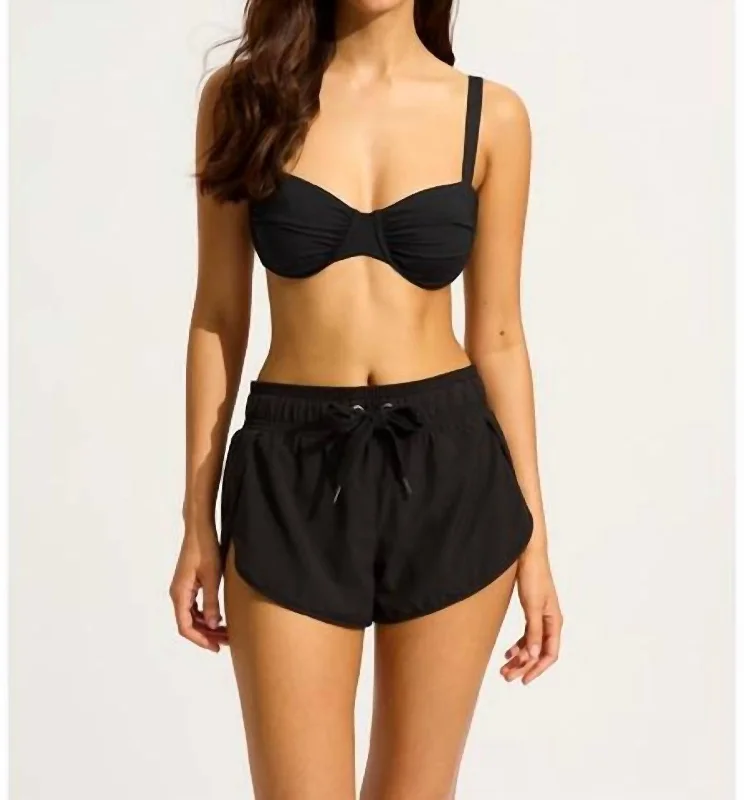 Get noticed with eye-catching women’s fashion   High Rise Boardshort In Black
