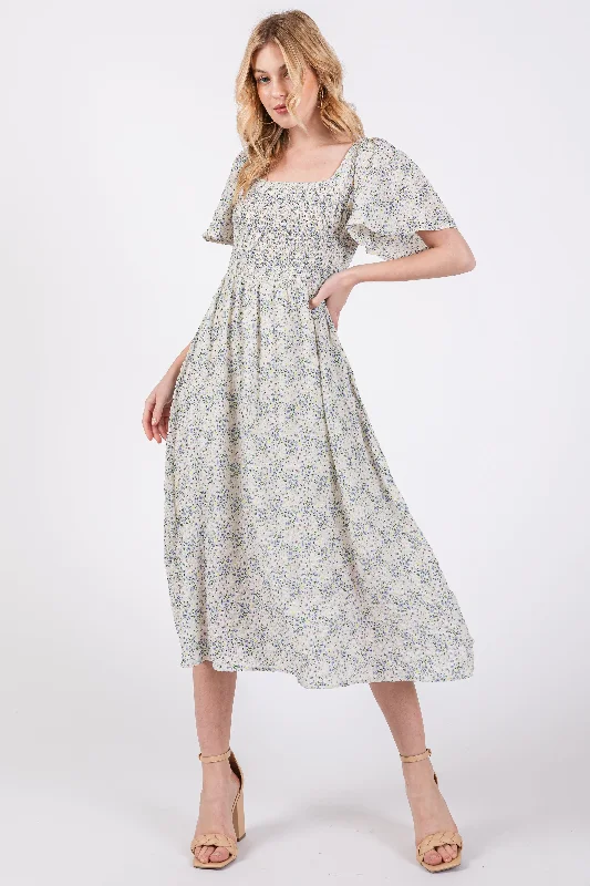 Dress up or down with these versatile pieces White Floral Square Neck Smocked Midi Dress Dress up or down with these versatile pieces White Floral Square Neck Smocked Midi Dress