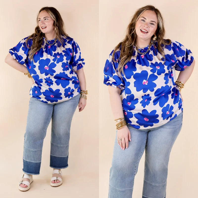 Sporty-chic women’s apparel for active lifestyles Divine Design Floral Blouse With Puffed Sleeve and Ruffle Neckline in Cobalt Blue Sporty-chic women’s apparel for active lifestyles Divine Design Floral Blouse With Puffed Sleeve and Ruffle Neckline in Cobalt Blue