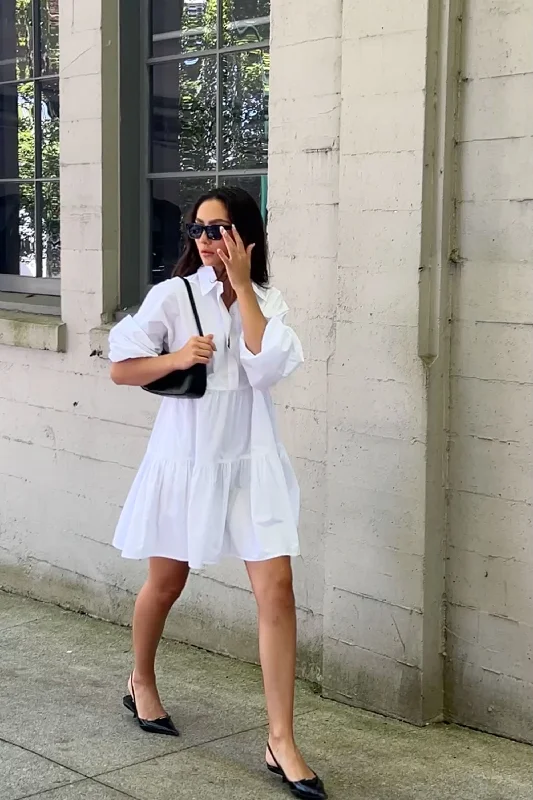 Timeless clothing pieces every woman should own   COLLARED BUTTON FRONT TIERED DRESS