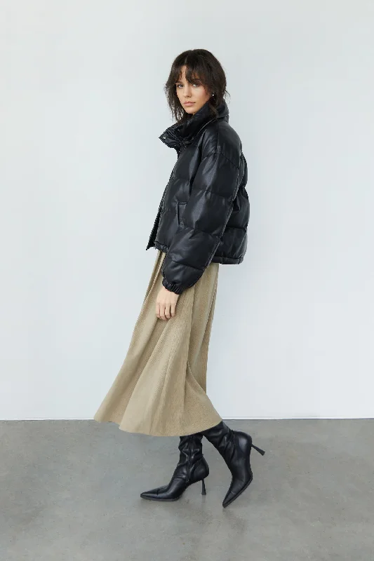 Step into style with our women’s clothing collection   CORDUROY MIDI SKIRT