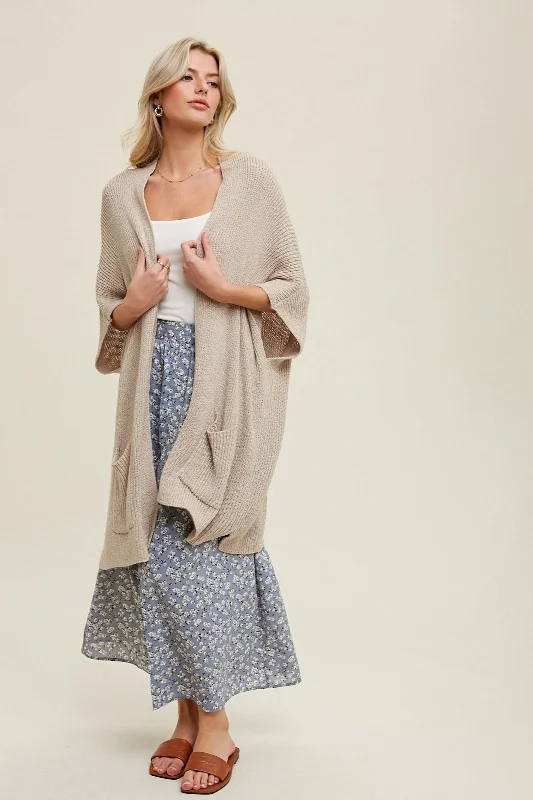 Casual yet chic women’s outfits for work or play Cream Drop Shoulder Side Pocket 3/4 Sleeve Cardigan Casual yet chic women’s outfits for work or play Cream Drop Shoulder Side Pocket 3/4 Sleeve Cardigan