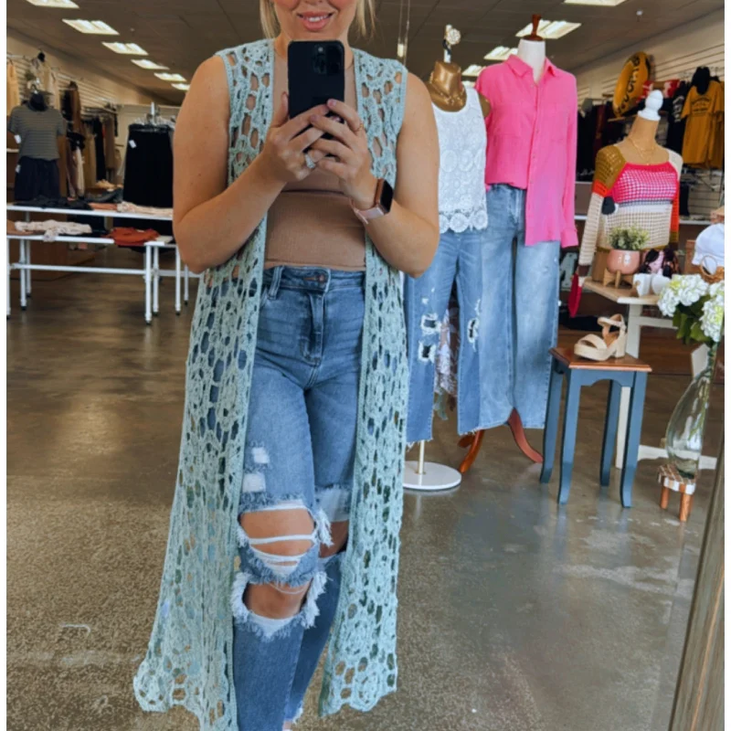 Get noticed with eye-catching women’s fashion   Crochet Sleeveless Long Cardigan