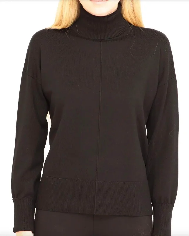 Casual yet chic women’s outfits for work or play Long Sleeved Turtleneck With Side Slits In Black Casual yet chic women’s outfits for work or play Long Sleeved Turtleneck With Side Slits In Black