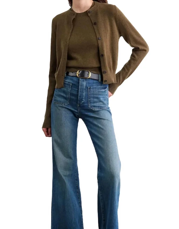 Dress up or down with these versatile pieces   March Cardigan Sweater In Dark Moss