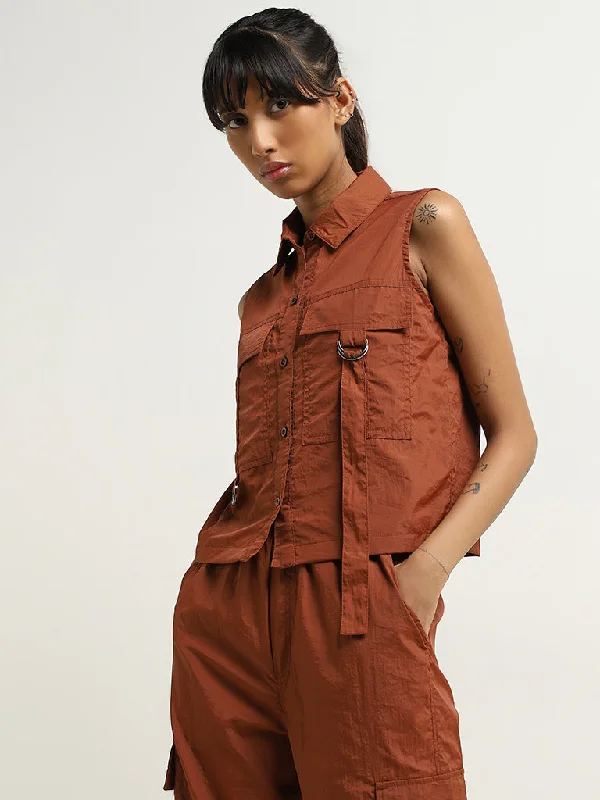 Get noticed with eye-catching women’s fashion Studiofit Rust Sleeveless Utility Jacket Get noticed with eye-catching women’s fashion Studiofit Rust Sleeveless Utility Jacket