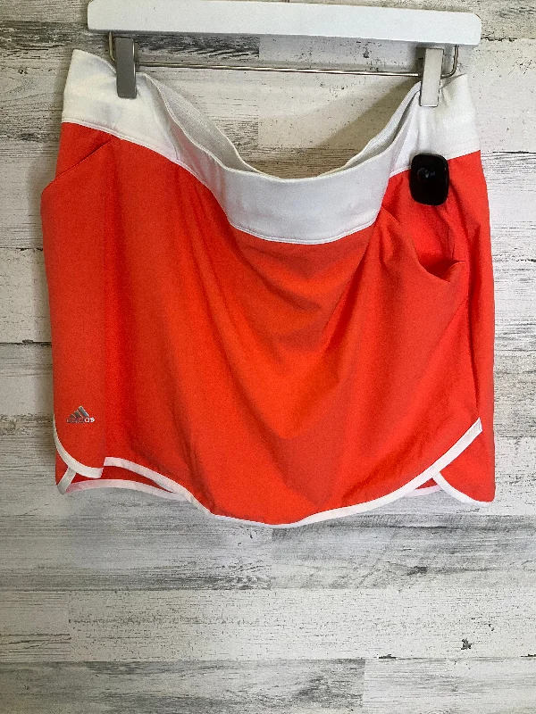 Dress to impress with elegant women’s wear   Orange Athletic Skort Adidas, Size Xl