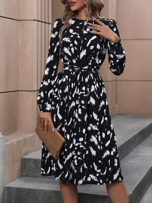 Elevate your look with premium women’s wear   Printed Tie Back Long Sleeve Dress