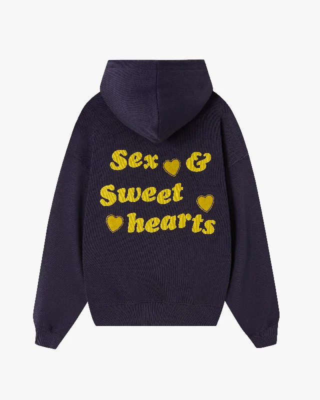 Bold, confident, and stylish women’s clothing   "PLEASURES" HOODIE NAVY