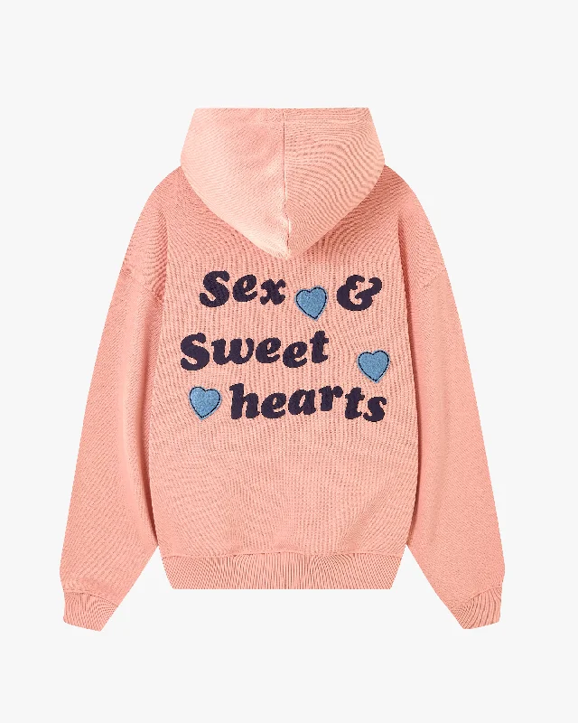 Effortlessly chic fashion for today’s woman   "PLEASURES" HOODIE PINK