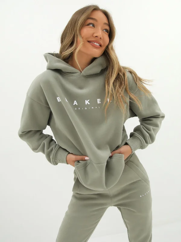 Get noticed with eye-catching women’s fashion   Composure Oversized Hoodie - Olive