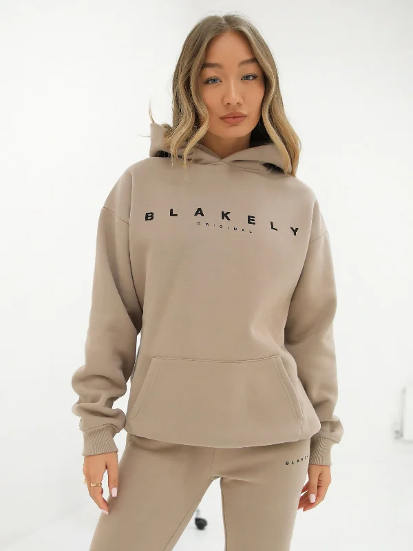 Dress up or down with these versatile pieces   Composure Oversized Hoodie - Tan
